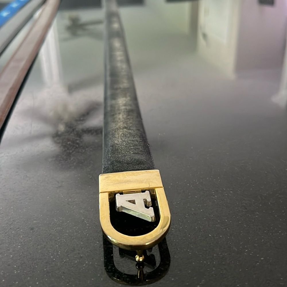 Black brown belt gently used with the initial a on the buckle reversible” long